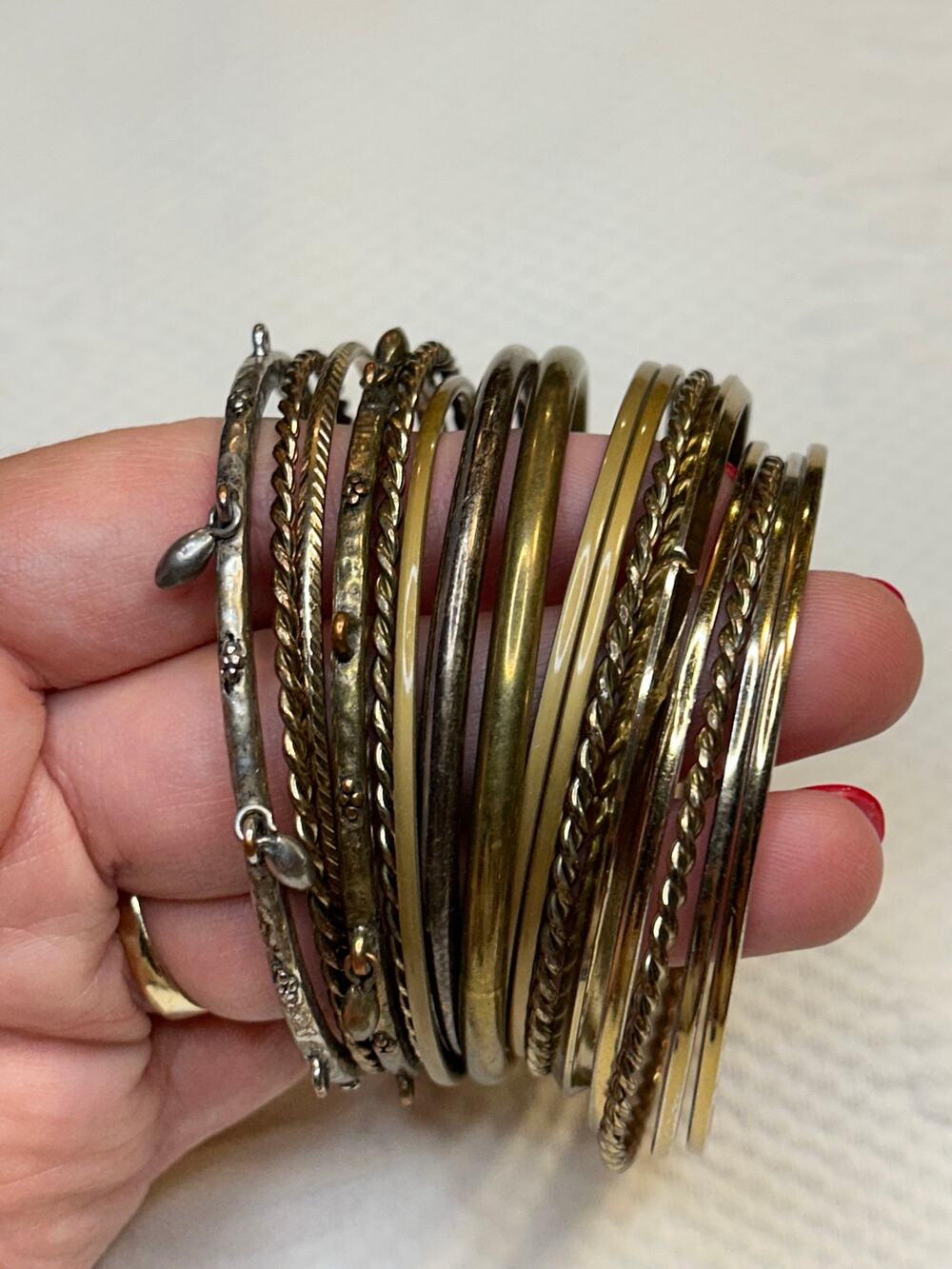 Set of 16 gold, brass, copper, silver toned bracelets
